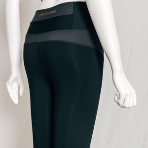 Back product image of YOGASANA Brandi Minimalist Leggings in Midnight New York black with grey contrast waistband, showing sculpted seam lines.