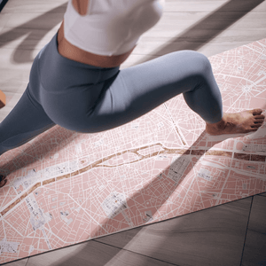 Woman practicing lunge pose on Yogasana Urban Portrait 1mm Soft-touch Yoga Mat in Daylight Paris design.