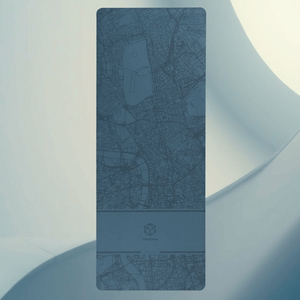 Urban Sketch Misty London yoga mat flat lay showcasing city-inspired map design and YOGASANA branding.