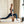 Yogasana Urban Portrait Midnight New York yoga mat and wheel used during lunge pose for balance and focus.