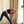 Model practicing triangle pose on YOGASANA Urban Portrait 4mm Natural Rubber Yoga Mat – Midnight New York, showcasing precise alignment lines and steady traction.