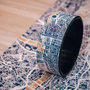 Yogasana Urban Portrait Yoga Wheel in Misty London design placed on matching city map yoga mat.