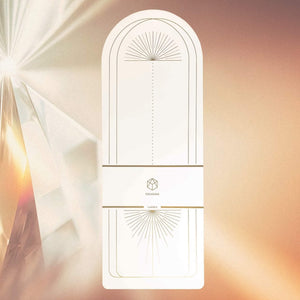 Yogasana Lumiere Sundial Bundle – White with Golden Pattern Edition, yoga mat displayed with elegant sunrise design.