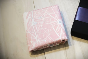 Folded Yogasana Urban Portrait 1mm Soft-touch Yoga Mat in Daylight Paris design with city map print and logo.