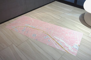 Yogasana Urban Portrait 1mm Soft-touch Yoga Mat in Daylight Paris design laid flat indoors, featuring pink and gold Paris city map pattern.