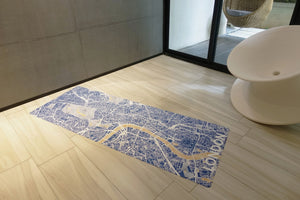 Yogasana Urban Portrait 1mm Soft-touch Yoga Mat in Misty London design laid flat indoors, featuring blue and gold London city map pattern.